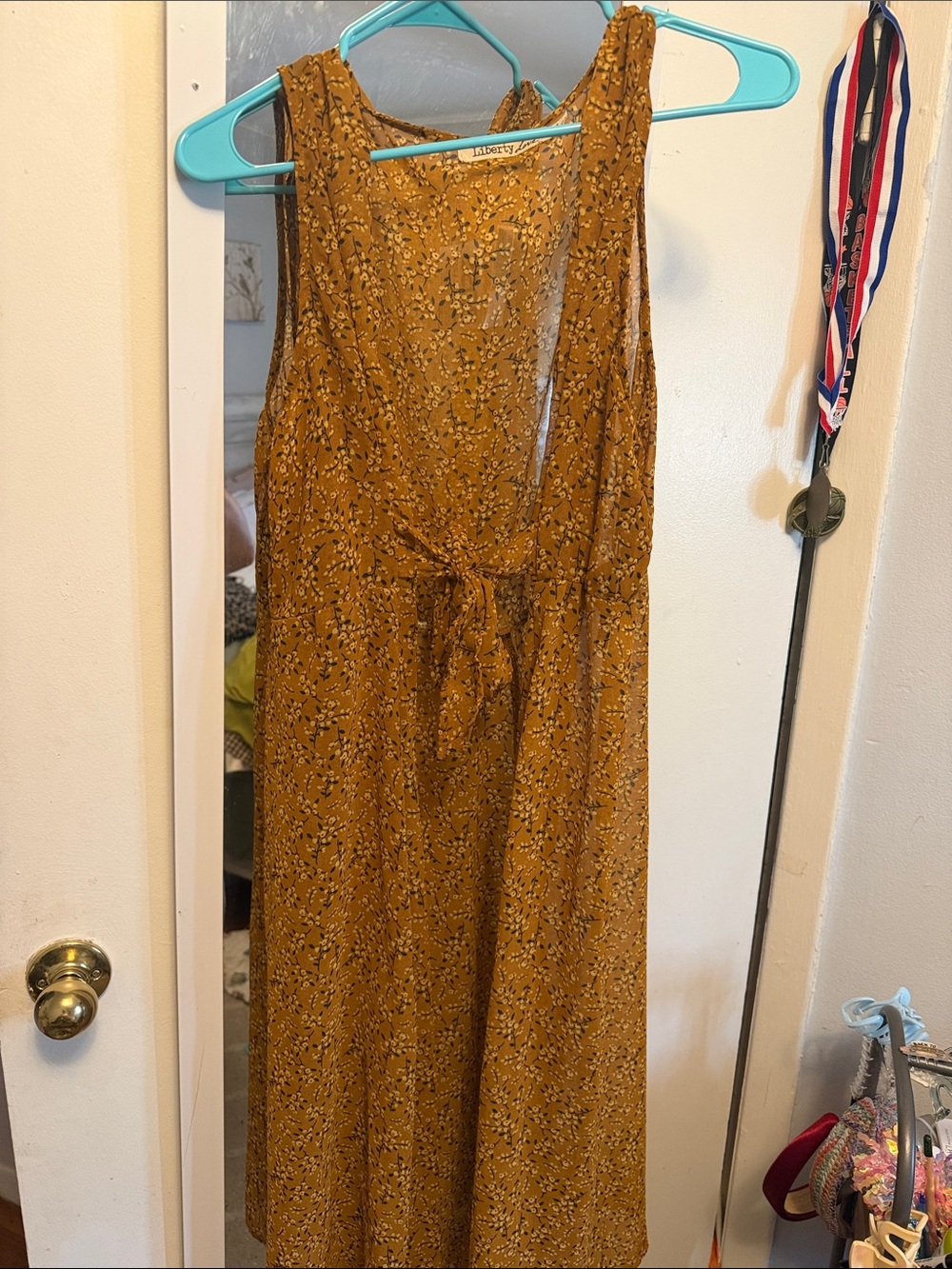 Liberty Love Mustard Yellow Floral Sleeveless Tie-Waist blouse